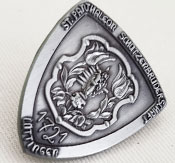 Eksempel på metalstøbt pin